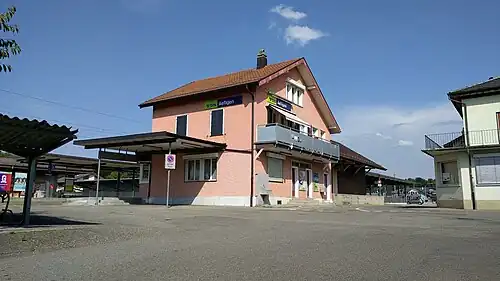 Two-story building with gabled roof