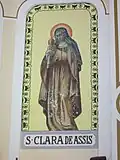 Saint Clare of Assisi holding a ciborium