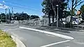 Level crossing and station entrance