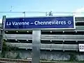 Sign of the name station on a platform