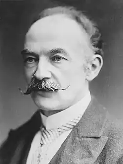 Black-and-white head shot of Hardy