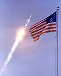 Condensation cone around the ساترن ۵ rocket carrying آپولو ۱۱.