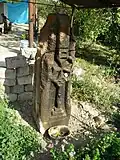 Pillar style khachkar with a صلیب مالتی located behind a house in the village.