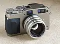 کانتاکس G1 با لنز تله دو وجهی f2 45 mm