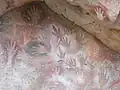 پای ریا (پرنده) در میان دست‌های انسان