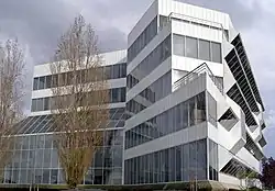 The exterior of the building showing its simple paneling