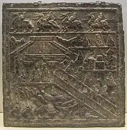 Stone carving from the Eastern Han Dynasty, with depiction of a waterside pavilion overlooking a lake full of fish, turtles, and waterfowl