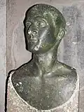 مجسمهٔ برنزی به‌دست آمده از خانهٔ شمارهٔ ۶ موسوم به کاسا دِلِرما دی برونزو