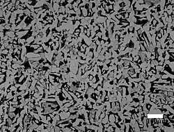 Ferrite (light gray) and perlite (dark gray) in carbon steel A285 (% wt. : 0.18 C, 0.43 Mn, 0.009 P, 0.026 S)