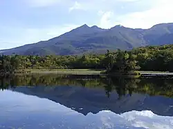 Mountains reflected in a lake.