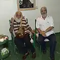 مظهری در کنار محمد رضا لطفی در مکتب خانه میرزا عبدالله