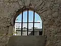 Window in old prison, Matthew Town, Great Inagua.