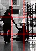 در اینجا نیز عناصری که «گفتن» را در نقاط طلایی قرار داده‌اند: الف روی بچه، ب روی پاهای پدرش و د روی گدا. این سه نقطه به تنهایی برای ناظر داستانی را بیان می‌کند.