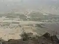 نمای دشت و روستاهای اطراف غار شاپور از دهنه غار