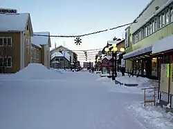 The main street (Storgatan) and December 2005 snow and Christmas lights in Gällivare