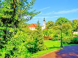 Park in Wieliczka with church in background