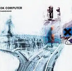 A highly edited image of a highway. In the top left corner is written "OK Computer", with text beneath reading "Radiohead".