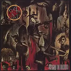 An image of the album cover featuring a demonic creature being carried on a chair by two people on each side. These people are carrying it over a sea of blood where several heads of corpses are floating. In the top left corner of the album is Slayer's logo while in the bottom right corner is the album title "Reign in Blood".