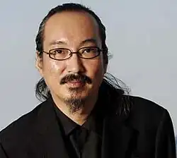 A photograph of Satoshi Kon