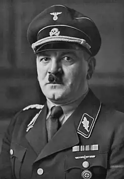 یولیوس شرک اولین فرمانده اس اس و یک نظامی آلمانی بود که راننده شخصی ادولف هیتلر نیز بود.