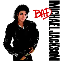 A man in his late twenties stands and looks forward. His hair is curly and black. He is wearing a black jacket that has several buckles and pants. The background is white and beside him are the words "Michael Jackson" in black capital letters, and over them, "Bad" in red.